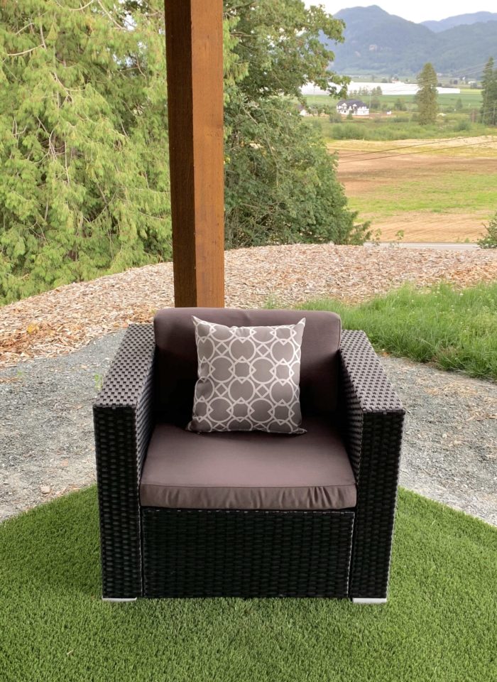Club chair with dark grey cushion