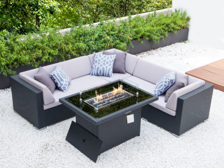 Symmetrical L with fire table and light grey cushions