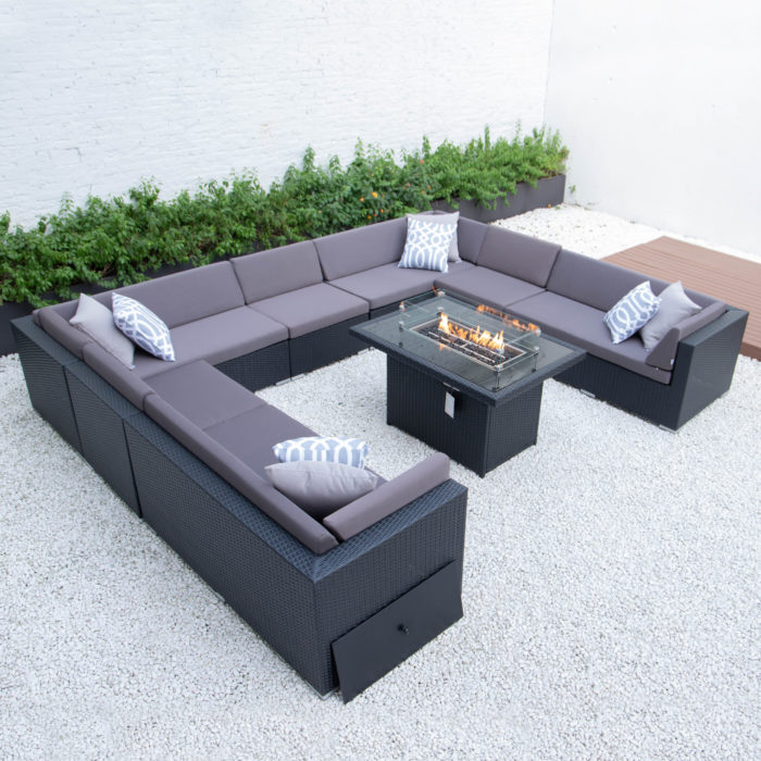 Giant u shaped with wicker fire table in dark grey cushions